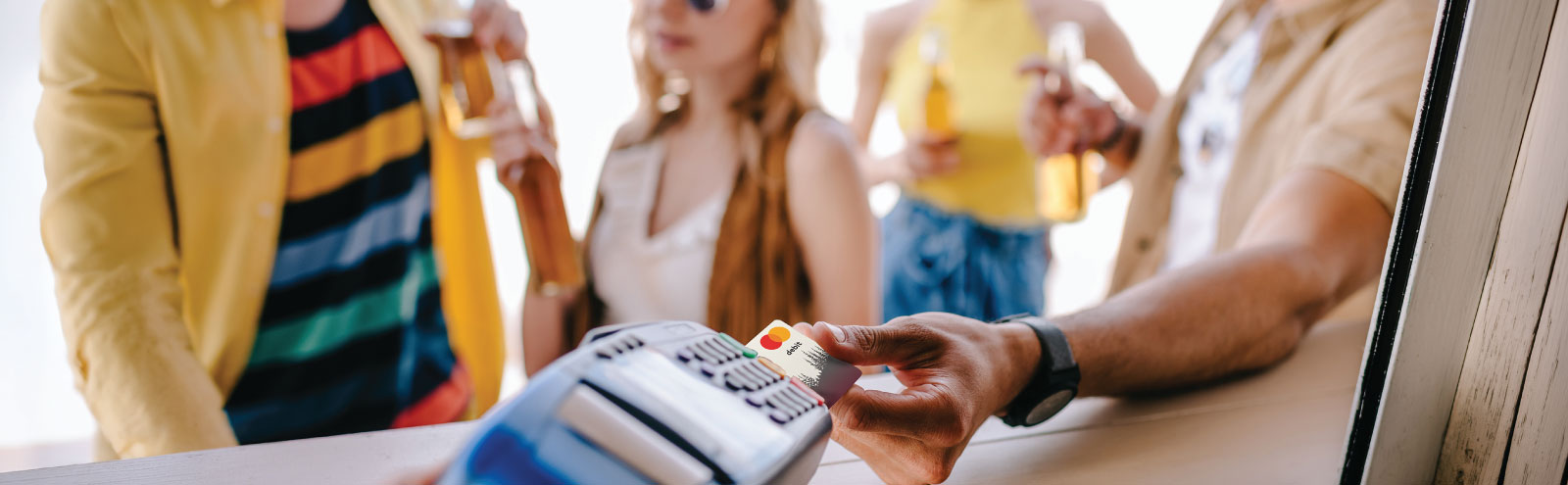 Paying for friends on vacation with debit card.
