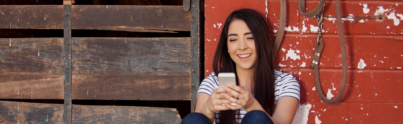 Young lady using her smartphone