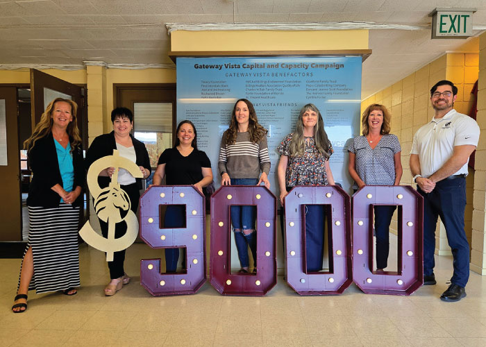 First Federal employees and members of YWCA holding $9,000 numbers.
