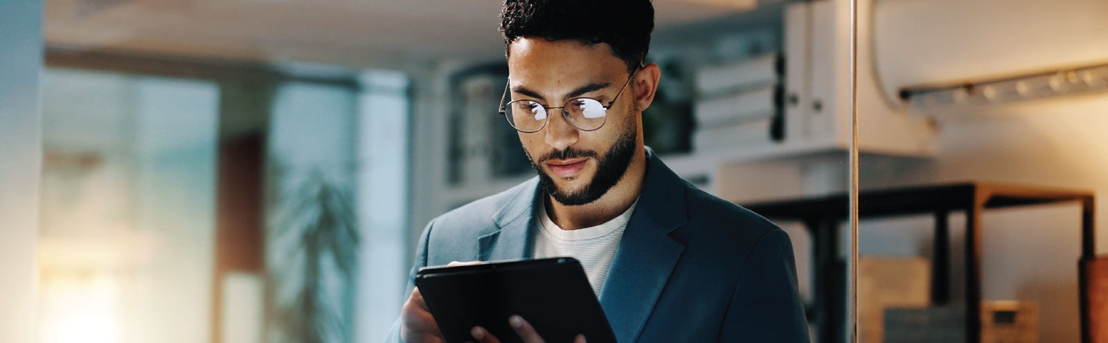 Businessman using tablet at the office.