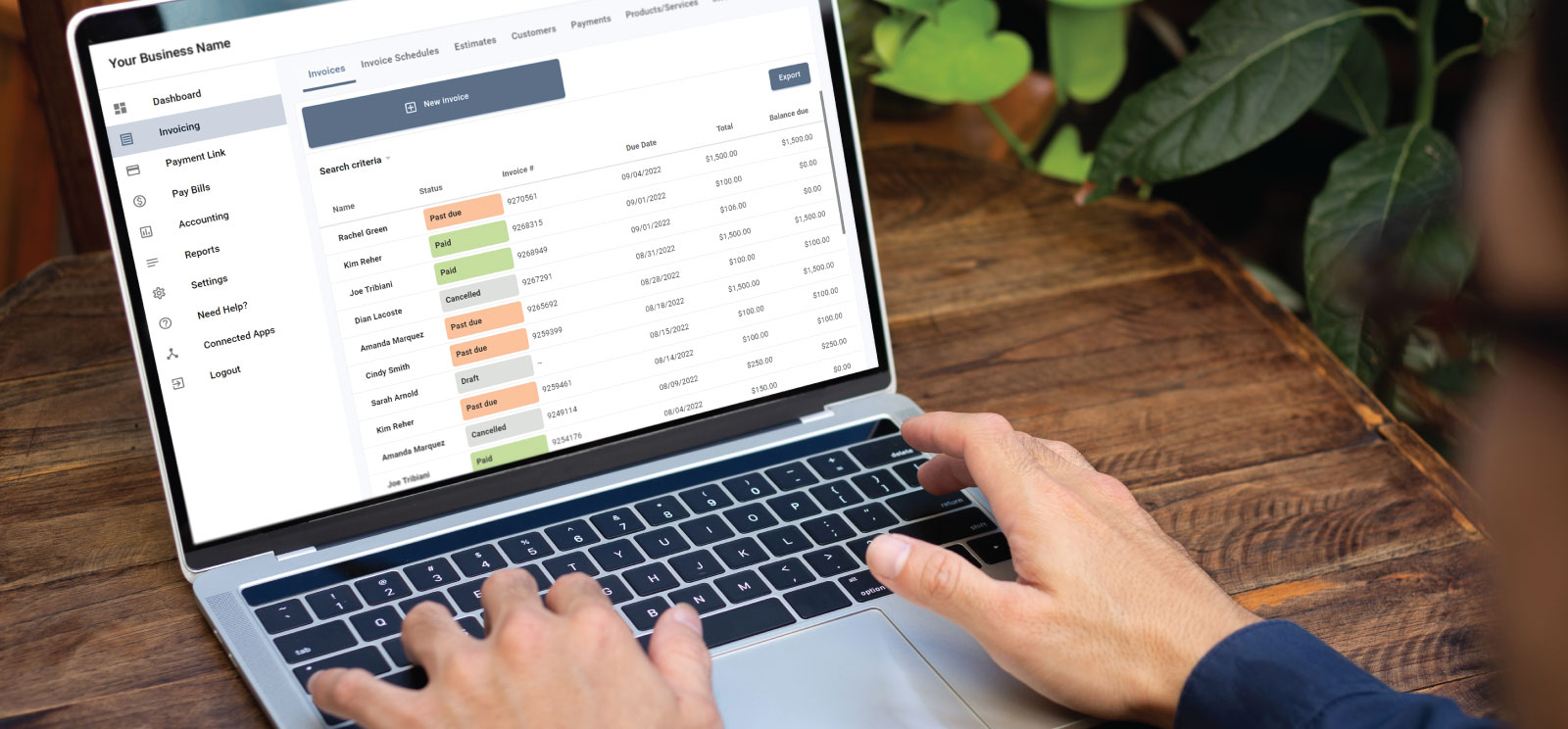 Laptop with list of invoices.